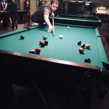 Metropolitan Billiard Parlor - a man playing pool - Pool Halls Near Me - Morgantown, West Virginia Metropolitan Billiard Parlor - a man playing pool - Pool Halls Near Me - Morgantown, West Virginia