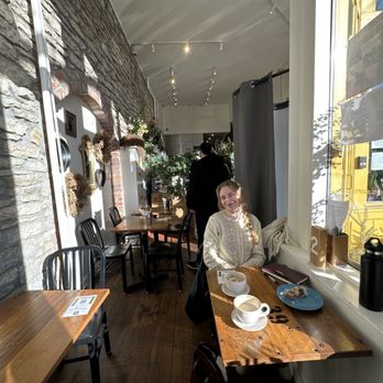 Cafe Astoria - tables, space, brick walls, ceiling, lights, windows, lattes - Coffee & Tea Near Me - Saint Paul, Minnesota
