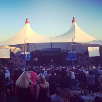 Bridge School Benefit Concert - a large crowd of people at a concert - Music Venues Near Me - Mountain View, California
