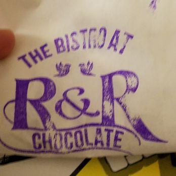 R&R Chocolate - A paper bag filled with treats. - Chocolatiers & Shops Near Me - Wells, Maine R&R Chocolate - A paper bag filled with treats. - Chocolatiers & Shops Near Me - Wells, Maine
