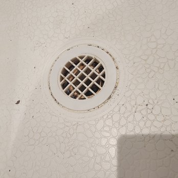 Global Luxury Suites - Debris left in the shower after the washing machine repair. - Vacation Rentals Near Me - Jersey City, New Jersey Global Luxury Suites - Debris left in the shower after the washing machine repair. - Vacation Rentals Near Me - Jersey City, New Jersey