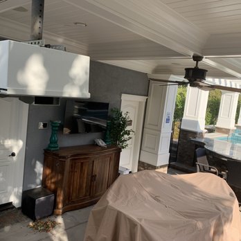 Audio Visual Innovations - Projector integration with backyard speakers - Home Theatre Installation Near Me Audio Visual Innovations - Projector integration with backyard speakers - Home Theatre Installation Near Me