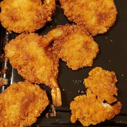 In my shrimp dinner is a burnt chicken nugget. I took a picture, it's not a shrimp!