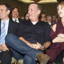 Baron Brown Studio - Tom Hanks with Joanne Baron and DW Brown listening to speech from playwrite John Patrick Shanley, at Alumni Ceremony