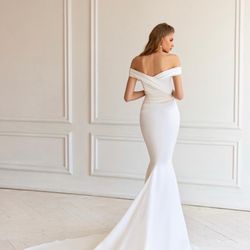 Bridal By Mina - The dress is straight and off the shoulders
