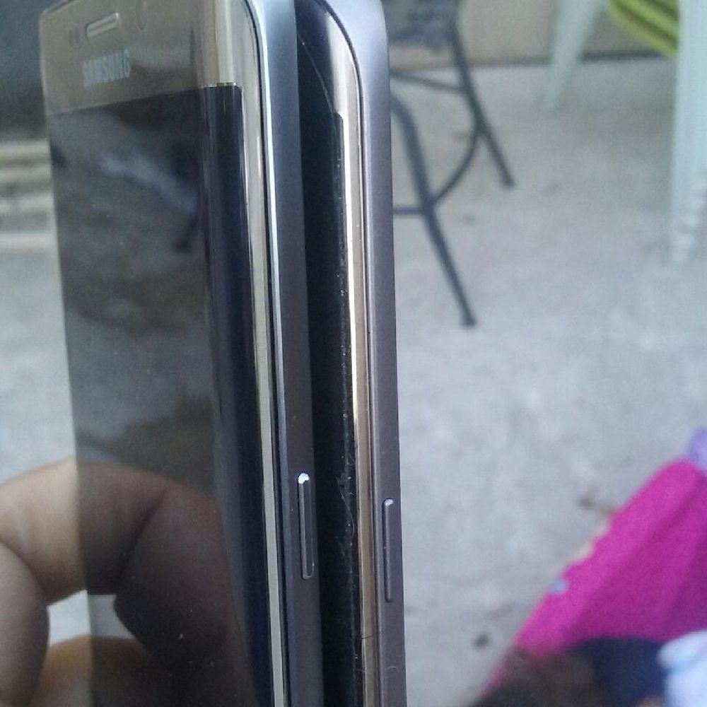 MD Wireless - my phone is on the left and a factory phone on the right. you can clearly see the gap that shows the phone was not properly fixed and sealed - Mobile Phones Near Me - Pleasant Hill, California