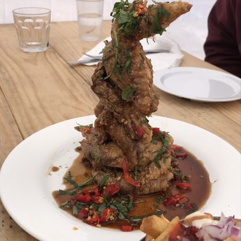 Nue - Tower of Chengdu Wings - Tapas/Small Plates Near Me - Seattle, Washington Nue - Tower of Chengdu Wings - Tapas/Small Plates Near Me - Seattle, Washington