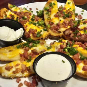 Darryl's Wood Fired Grill - Bacon cheddar potato wedges Really good and loaded - New American Near Me - Greensboro, North Carolina
