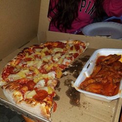 Two Guy's Pizza - Pepperoni and pineapple pizza. With hot wings