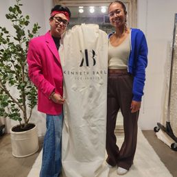 Her amazingly breathtaking, one-of-a-kind Kenneth Barliss wedding reception dress is inside the bag. Her amazingly breathtaking, one-of-a-kind Kenneth Barliss wedding reception dress is inside the bag.