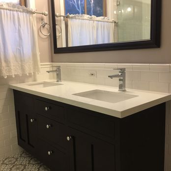 Artwork Remodeling - a bathroom with a sink and mirror - General Contractors Near Me - Redondo Beach, California