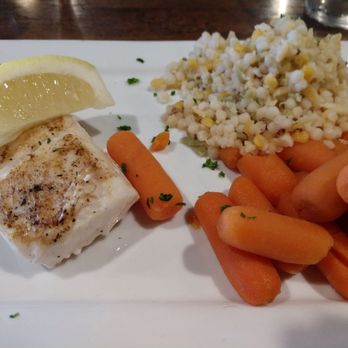 The Feast Restaurant - Grilled halibut - Seafood Near Me - Holmes Beach, Florida The Feast Restaurant - Grilled halibut - Seafood Near Me - Holmes Beach, Florida