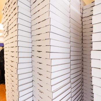 Primo Pizza - a stack of pizza boxes - Pizza Near Me - Monticello, Minnesota Primo Pizza - a stack of pizza boxes - Pizza Near Me - Monticello, Minnesota