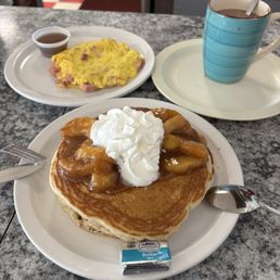 Apple pancake, cheesy eggs with ham, hot cocoa after I ate an entire cup of whipped cream off the top. Apple pancake, cheesy eggs with ham, hot cocoa after I ate an entire cup of whipped cream off the top.