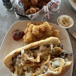 Prime Rib sandwich with tater tots