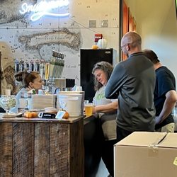 Smuttynose Brewing - Tasting Bar - The staff picking the beer name winner.