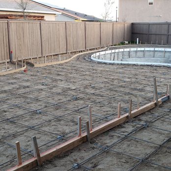 Thomas Pools and Spas - Rebar and shaping ready for cement. The long 2x4 is holding the deck drain. - Pool & Hot Tub Service Near Me - Ceres, California