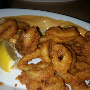 Les Enfants Terribles - Frid Calamari. Oily and rubbery - French Near Me - Laval, Quebec Les Enfants Terribles - Frid Calamari. Oily and rubbery - French Near Me - Laval, Quebec