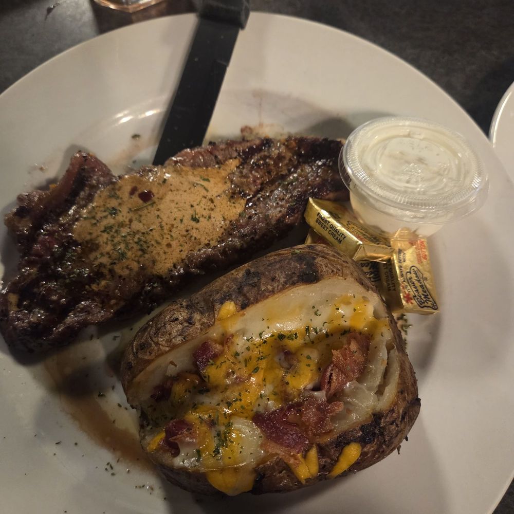 Davidson's - 8 oz steak - med rare and a baked potato with cheese and bacon - New American Near Me - Canfield, Ohio