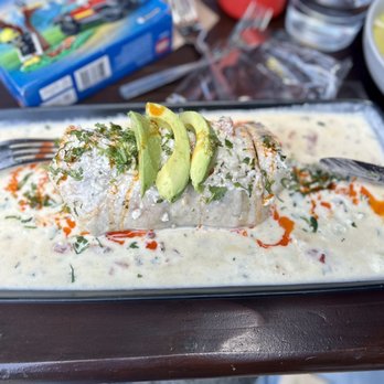 Tamale Boy - a plate of food on a table - Mexican Near Me - Portland, Oregon