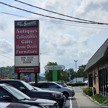 Buy the Season - The large and tall street sign of the store with a few words trying to describe some of the things found inside. - Home Decor Near Me - Salem, Virginia