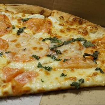 DJ's Pizza - Margarita, looks different from the traditional one but tastes Awsome! - Pizza Near Me - Shelton, Connecticut