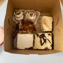 The Flour Shop in West Milford NJ - Apple roses - a somewhat eaten Tres leches by me (haha)- bourbon brownie - lemon square and more wow !!!