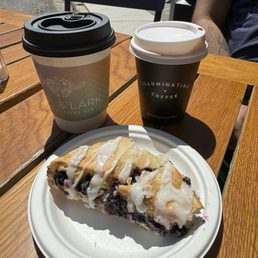 1 coffee is from owl and lark and then another from blackberry market with a blueberry scone