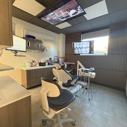 ABQ Gentle Dentistry - Patient rooms with Ceiling mounted TVs to keep you occupied while they work. ;)