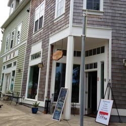 Cafe C'est La Vie - Cafe entrance. Sidewalk seating on both west and south sides.
