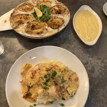 Edward's - looks good but not the best - Grilled chicken meal, Shrkmp baked oysters, parmesan grits - New American Near Me - Rosemary Beach, Florida Edward's - looks good but not the best - Grilled chicken meal, Shrkmp baked oysters, parmesan grits - New American Near Me - Rosemary Beach, Florida