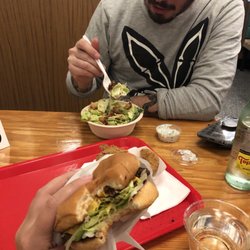 Burgerlords - Highland Park - Realized after I took a bite of my (meat) burger I probably should take a photo -- vegan Caesar in the back!