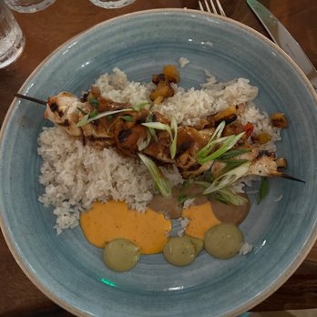 Hudson On The River - Chicken skewers with coconut rice - New American Near Me - Stuart, Florida Hudson On The River - Chicken skewers with coconut rice - New American Near Me - Stuart, Florida