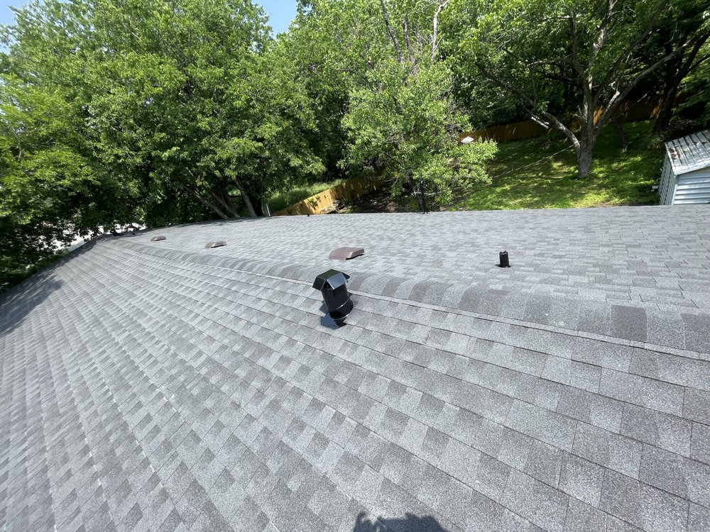 Slide of Spartan Roofing