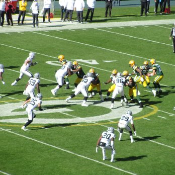 Lambeau Field - Rodgers hands off to RB Aaron Jones (10/20/19) - Stadiums & Arenas Near Me - Green Bay, Wisconsin Lambeau Field - Rodgers hands off to RB Aaron Jones (10/20/19) - Stadiums & Arenas Near Me - Green Bay, Wisconsin