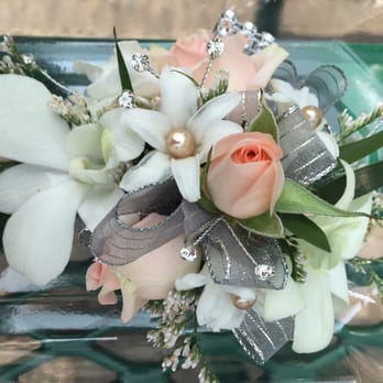 Wild Orchid - Picking up the wrist corsage for prom tonight! - Florists Near Me - Middletown, Connecticut