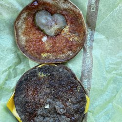McDonald's - 3 little pieces of onion and the patty looks old and gross! I did not eat this...