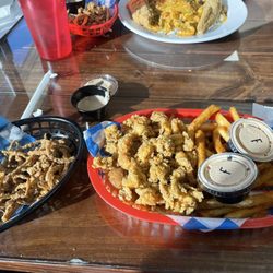 fontenots - Fried crawfish, hush puppies & Cajun fries; on the left is fried onion rings