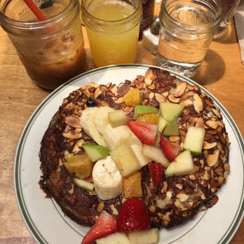 MUD - Almond crusted sourdough french toast, half consumed iced coffee, and mimosa - Coffee & Tea Near Me - New York, New York MUD - Almond crusted sourdough french toast, half consumed iced coffee, and mimosa - Coffee & Tea Near Me - New York, New York