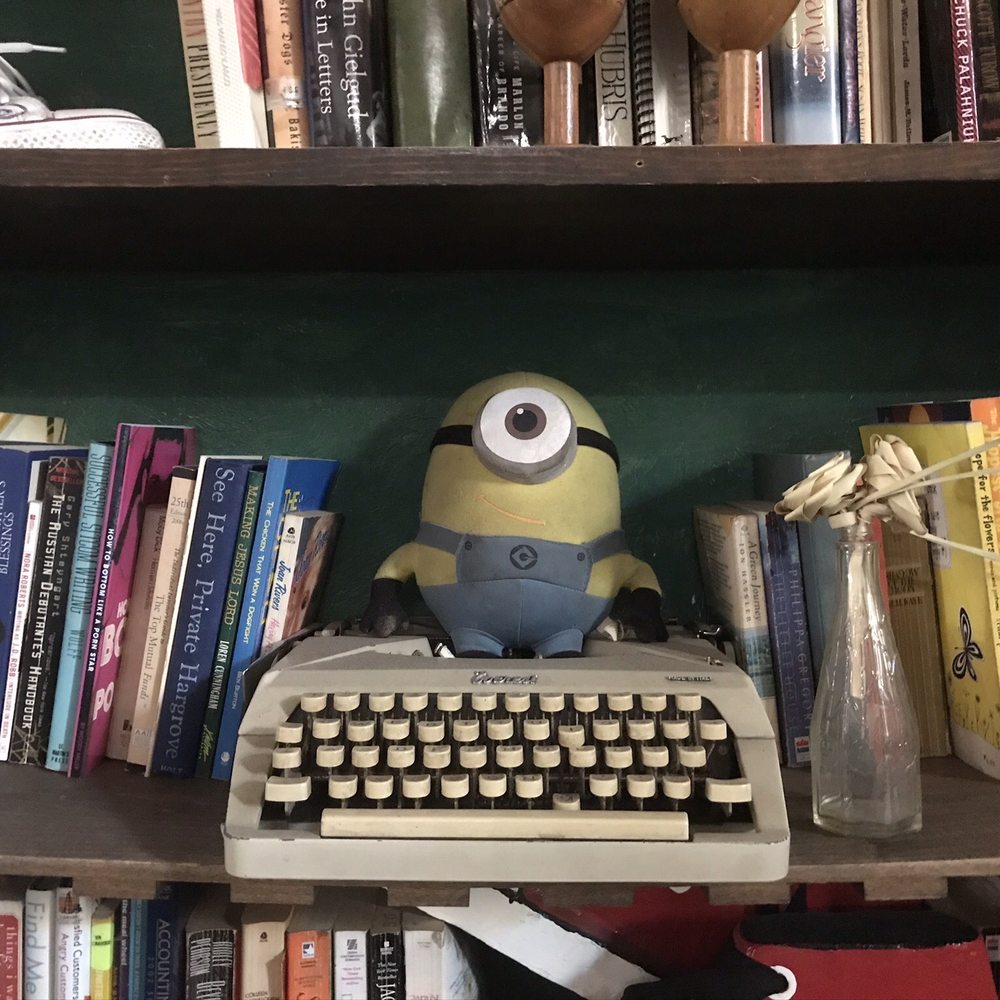 Back to the Grind - Part of the book wall - Coffee & Tea Near Me - Riverside, California