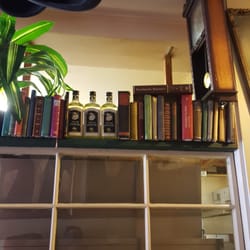 The Pizza Library Co. - Quirky interior design, hats dangling from the ceiling, old books, etc.