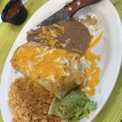 Chimichanga with shredded cheese on top instead of queso