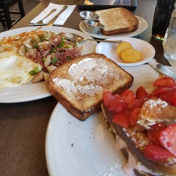 Southern Belle's - This was my 3rd visit. Yes everything on this table was for me, and I ate every single bite! Bonuts with extra blueberry marscapone to go! - Breakfast & Brunch Near Me - Barrington, Illinois