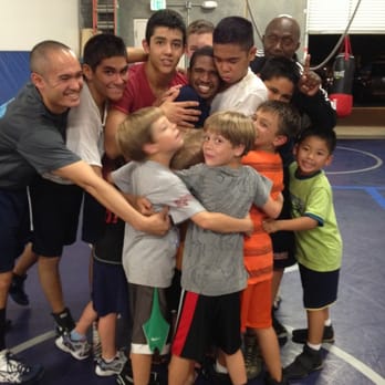 8 Limbs Fighting Academy - Kids wrestling class saying bye to one of the students - Martial Arts Near Me - Elk Grove, California 8 Limbs Fighting Academy - Kids wrestling class saying bye to one of the students - Martial Arts Near Me - Elk Grove, California