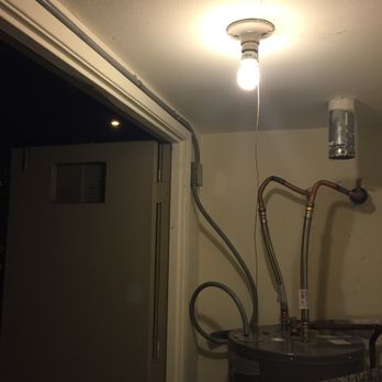 Current Electric and Lighting - Wires ran from newly installed electrical panel to new electric tank water heater - Electricians Near Me Current Electric and Lighting - Wires ran from newly installed electrical panel to new electric tank water heater - Electricians Near Me