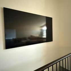 Tolliver Pro Services - TV mounted, even in tricky spots!
