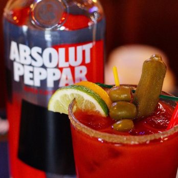 Broaddus Burgers - a bloody drink with a pickle garnish - Burgers Near Me - Lafayette, Louisiana Broaddus Burgers - a bloody drink with a pickle garnish - Burgers Near Me - Lafayette, Louisiana