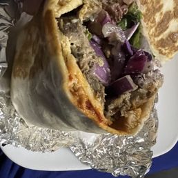 1/2 of a Chicken& Beef wrap 1/2 of a Chicken& Beef wrap