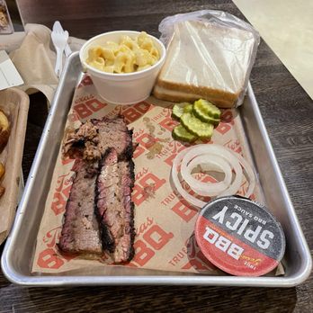 True Texas BBQ - Briskets with Mac - Barbeque Near Me - Pflugerville, Texas