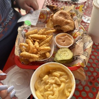 Dave's Hot Chicken - a plate of macaroni and cheese fries and a bowl of macaroni and cheese fries - Chicken Shop Near Me - McAllen, Texas
